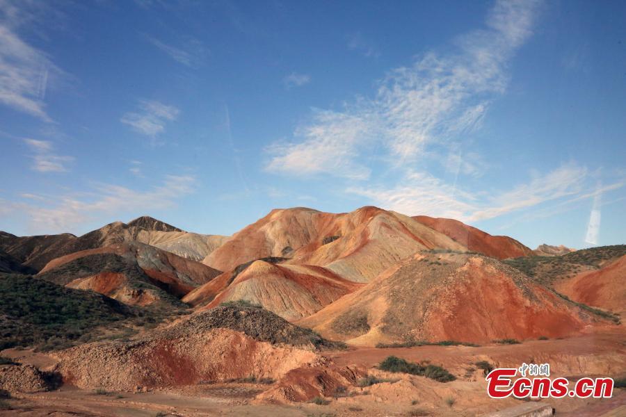 The colorful Danxia landform group, located in Zhangye City, Northwest China’s Gansu Province. At an average elevation of 1850 meters, the Danxia landform stretches east to west for 45 kilometers and north to south for 10 kilometers. More than a famous tourist attraction, the Danxia landform has been featured in a number of movies. (Photo: China News Service/Ren Haixia)