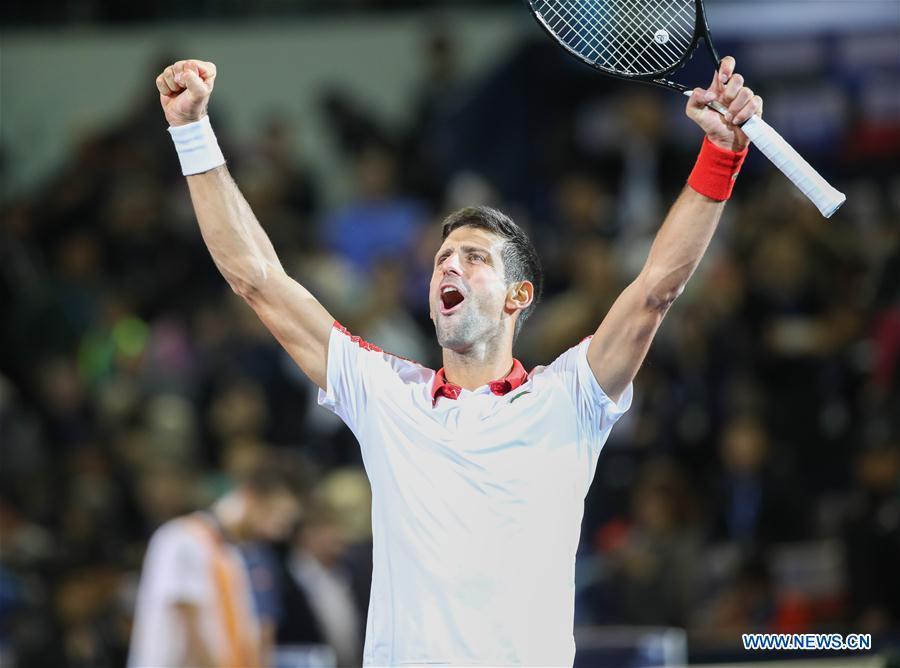 Novak Djokovic of Serbia celebrates after winning the men\'s singles final against Borna Coric of Croatia at 2018 ATP Shanghai Masters tennis tournament in Shanghai, east China, Oct. 14, 2018. Novak Djokovic won 2-0 in the final and claimed the title of the event. (Xinhua/Ding Ting)