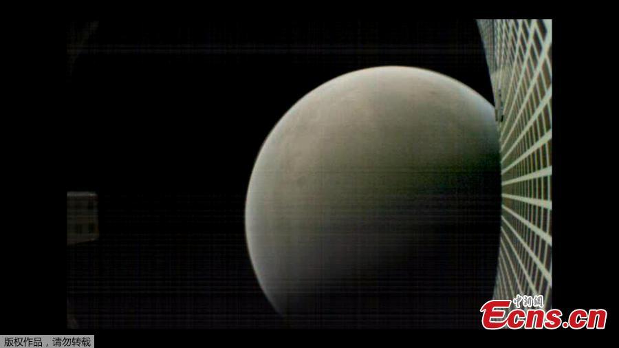 MarCO-B, one of the experimental Mars Cube One (MarCO) CubeSats, took this image of Mars from about 6,000 kilometers away during its flyby of the Red Planet on November 26, 2018. (Photo/Agencies)