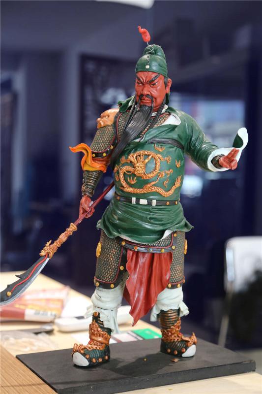 A dough figurine of Guan Yu, a character from Romance of the Three Kingdoms. (Photo by Li Hao/for chinadaily.com.cn)