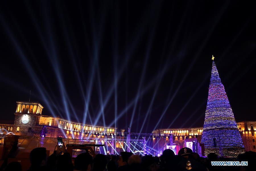 Photo taken on Dec. 21, 2018 shows the lit-up Christmas tree at the downtown Republic Square, heralding the start of New Year celebrations, in Yerevan, Armenia. (Xinhua/Gevorg Ghazaryan)